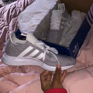 Gray adidas tennis shoes
